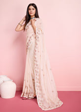 Cream organza saree looking lovely